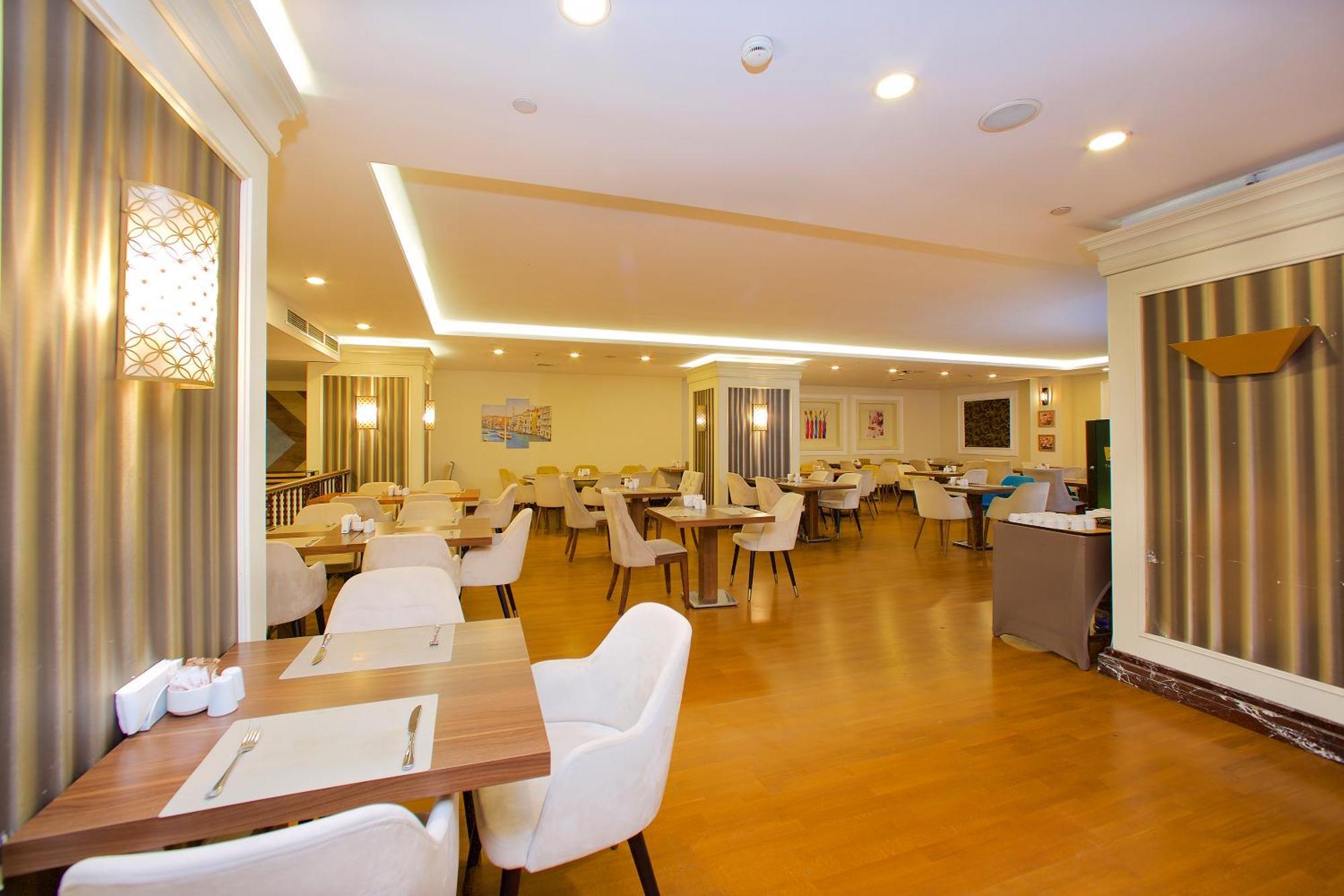 รามาดา โฮเทล แอนด์ สวีท บาย วินด์แฮม อิสตันบูล เมอร์เทอร์ Hotel ภายนอก รูปภาพ Restaurant